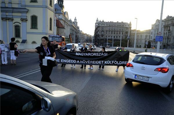 Hungarian healthcare workers block a bridge to protest